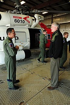 U.S. Coast Guard Lt. Cmdr. Tom Combs, an MH-60 Jayhawk helicopter pilot assigned to Coast Guard Air Station Kodiak, Alaska, gives Alaska Lt. Gov 120723-G-ZP298-002