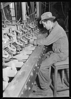 High Point, North Carolina - Upholstering. Tomlinson Chair Manufacturing Co. Multiple carver machine automatically... - NARA - 518488