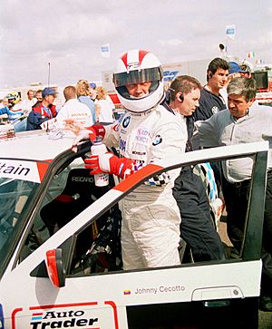 Johnny Cecotto - BMW 318i in the collecting area at the British GP support round of the BTCC 1995 (49772809991)