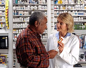 Man consults with pharmacist (2)