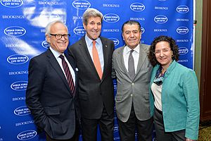 Secretary Kerry Poses for a Photo With Ambassador Indyk and Saban Forum Chairman Saban at the Brookings Institution's 2014 Saban Forum (15976561165)