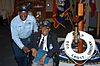 US Navy 060504-N-1561L-002 Ships Serviceman Vincent Ibiam, left, poses for a photo opportunity with visiting Tuskegee Airman retired Lt. Col. Charles Dryden, Sr., during Recognition Day Fleet Week USA events aboard USS San Anto.jpg