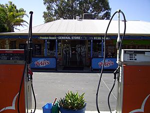 Preston Beach General Store with fuel pumps (E37@WTW2013)