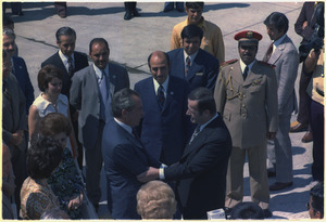 President Hafez al-Assad of Syria greets President Nixon on his arrival at Damascus airport - NARA - 194584