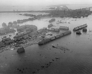 Netherlands. Viewed from a U.S. Army helicopter, gives a hint of the tremendous damage damage wrought by the flood - NARA - 541705