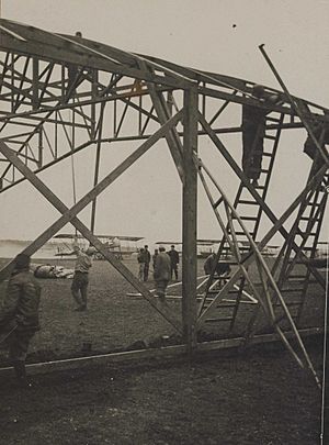 Bessonneau aircraft hangar under construction at Étampes aerodrome with French Farman MF.11s behind (cropped)