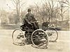 Elwood Haynes in his first automobile, the Pioneer, c 1910.jpg