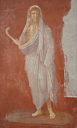 Saturn with head protected by winter cloak, holding a scythe in his right hand, fresco from the House of the Dioscuri at Pompeii, Naples Archaeological Museum (23497733210).jpg