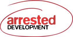 The words "Arrested Development" in red and black lettering