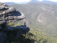 Left: View of the Balconies rock formation, formerly known as the Jaws of Death since it appears to be an open mouth of two rock slabs with a hiker standing inside
