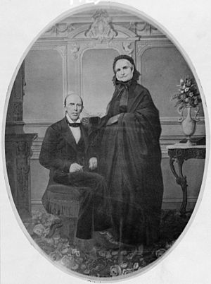 Francis Preston Blair seated and his wife standing alongside, full length portrait