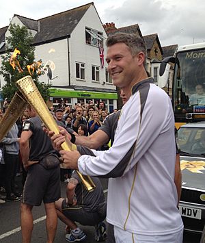 Dan Lobb carrying the Olympic Torch in Oxford.jpg