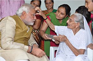 Narendra Modi meets his mother after winning the 2014 elections