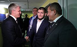 Sports Minister Pavel Kolobkov, left, congratulated Khabib Nurmagomedov on winning the UFC Championship