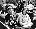 President and Mrs. Kennedy in motorcade, 03 May 1961
