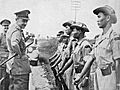 Sir Gerald Templer and his assistant, Major Lord Wynford inspecting the members of Kinta Valley Home Guard in Perak