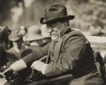 TR smiling in automobile
