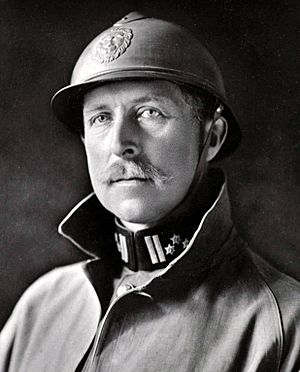A man wearing a military uniform with helmet