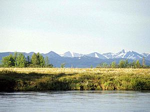 The view spans across the tundra from the banks of the Tuluksak river