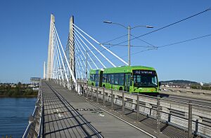 Nova Bus articulated bus of TriMet on the Tilikum Crossing, inbound on route FX2 (2023)