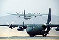 One U.S. Air Force C-130 Hercules aircraft taxis as another takes off from Yeo Ju airstrip during the joint U.S.-South Korean Exercise Team Spirit '84 DF-ST-84-11567