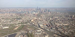 2014-05-07 16 24 44 View of Lower Manhattan, Jersey City, New Jersey, and several highways-cropped