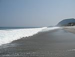 Left: Walls built by exiles on HachijojimaRight: A beach on Niijima