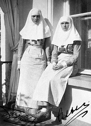 Grand Duchesses Olga and Tatiana Nikolaevna of Russia as nurses, signed