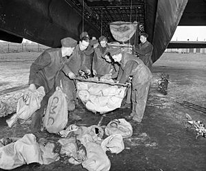 Loading Lancaster at RAF Waterbeach for Operation Manna 1945 IWM CH 15159