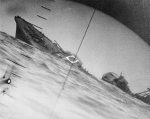 Torpedoed Japanese destroyer Yamakaze sinking on 25 June 1942