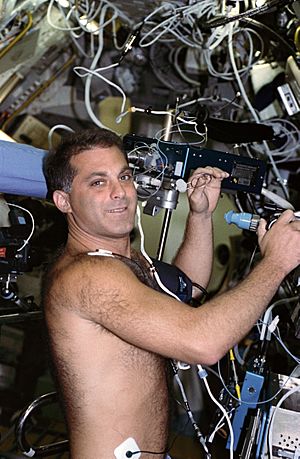 Astronaut David Wolf in medical experiment in SLS-2