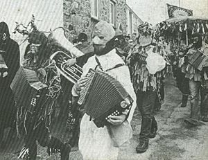 Guise dancers parading through St Ives, Cornwall (1974)