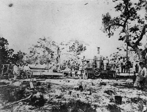 Workers standing on the Mary Ann first steam locomotive built in Queensland, 1875f
