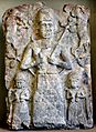 Cult wall relief from Assur. A deity, probably god Assur, is flanked by 2 water deities and 2 goats. 2000-1500 BCE. Pergamon Museum, Berlin