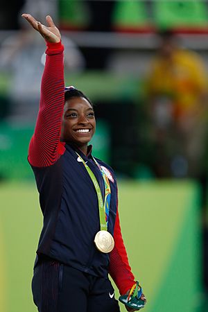 Simone Biles at the 2016 Olympics all-around gold medal podium (28262782114)