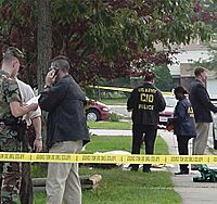 US Army CID agents at crime scene