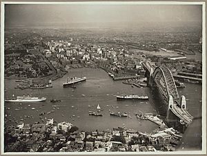 Aerial view of Sydney and Circular Quay on the day of the official opening of the Sydney Harbour Bridge, 19 March, 1932 (6174053762)