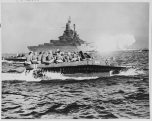 NH 42390 USS Tennessee (BB-43) with LVTs near Okinawa, 1945.png