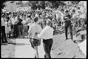 Moree Mayor Alderman William Loyd escorts SAF protestors away from the swimming pool, 17 Feb 1965 - The Tribune (20135202496)
