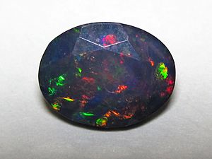 Black opal (Stayish Mine, Wollo Province, Ethiopia) 6 (23226115484)