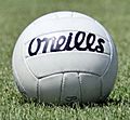 Gaelic football ball on pitch
