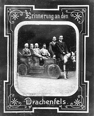 Frederick Stratton, John William Nicholson, K. Schwarzschild, Frank Watson Dyson ride in automobile.jpg