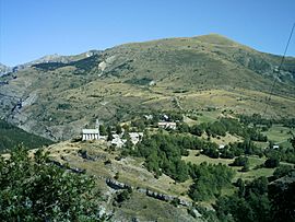 The village of Rabou and the summit of Puy, at 1,834 m (6,017 ft)
