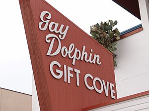 Gay Dolphin Gift Cove sign