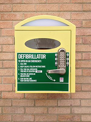 Public access AED with coded lock