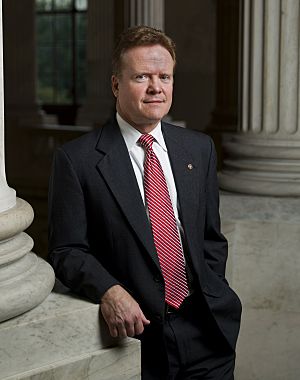 Jim Webb, leaning against pillar, 2007
