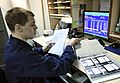 US Navy 110129-N-7676W-152 Culinary Specialist 3rd Class John Smith uses the existing DOS-based food service management system aboard the aircraft