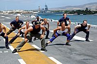 US Navy 060627-N-5290S-097 Gilad of the Fit TV show, Bodies in Motion, films a show aboard the amphibious assault ship USS Bonhomme Richard (LHD 6)