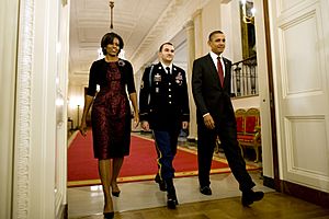 Defense.gov News Photo 101115-A-0193C-016 - President Barack Obama right Staff Sgt. Salvatore Giunta and First Lady Michelle Obama enter the East Room of the White House to begin the Medal