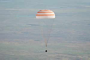 Soyuz TMA-20 capsule descends toward landing